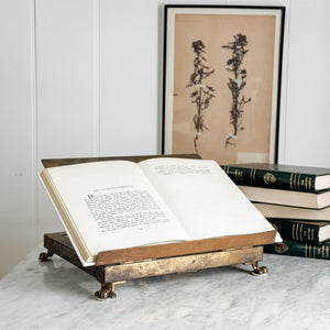 Vintage brass book display.