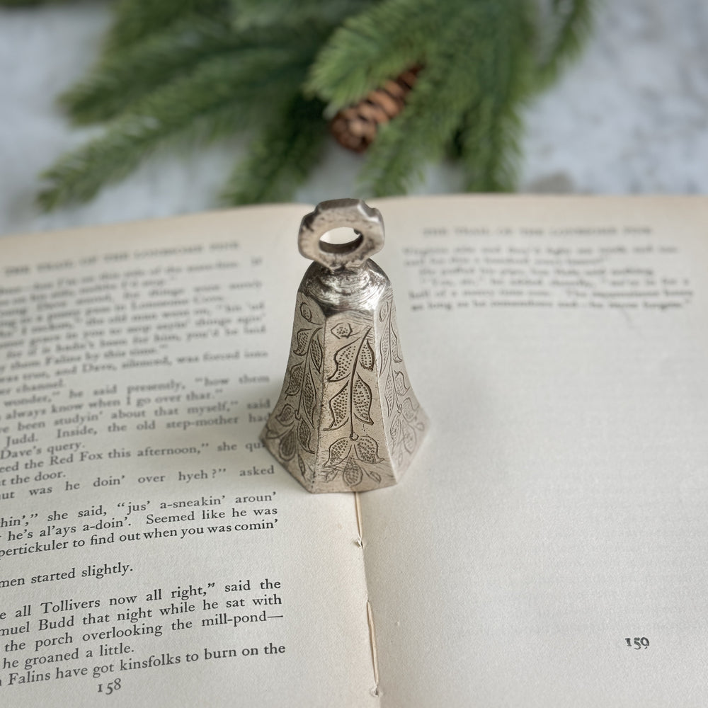 Vintage brass silver tone bell.