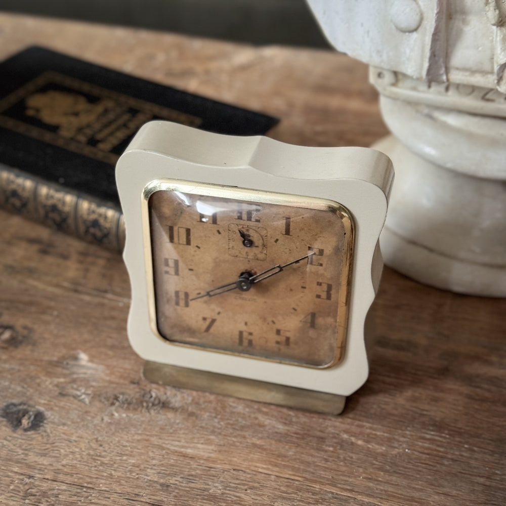 Vintage cream wave Beacon clock.
