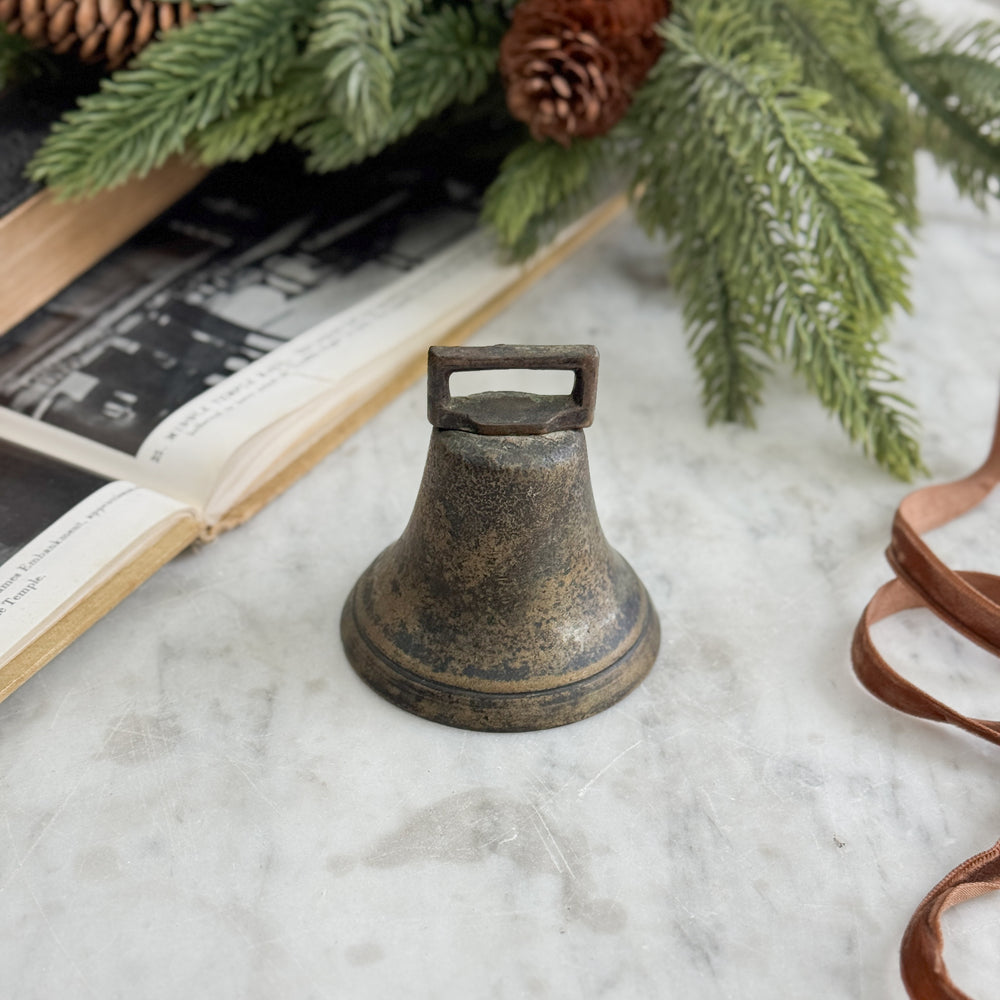 Vintage brass cow bell.