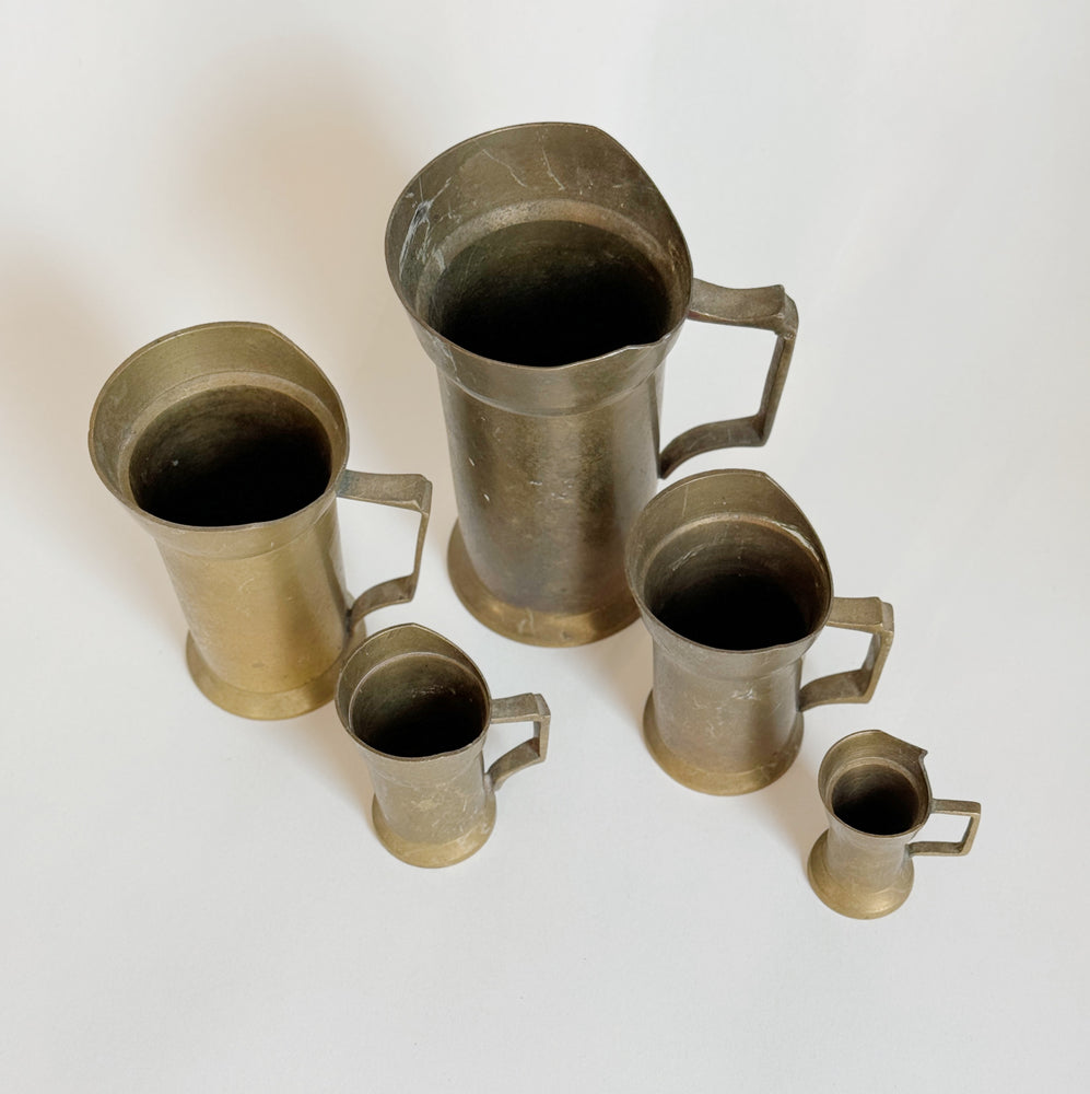 Vintage Brass Measuring Cup Set.