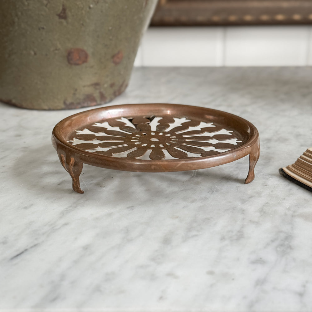 Vintage copper trivet.