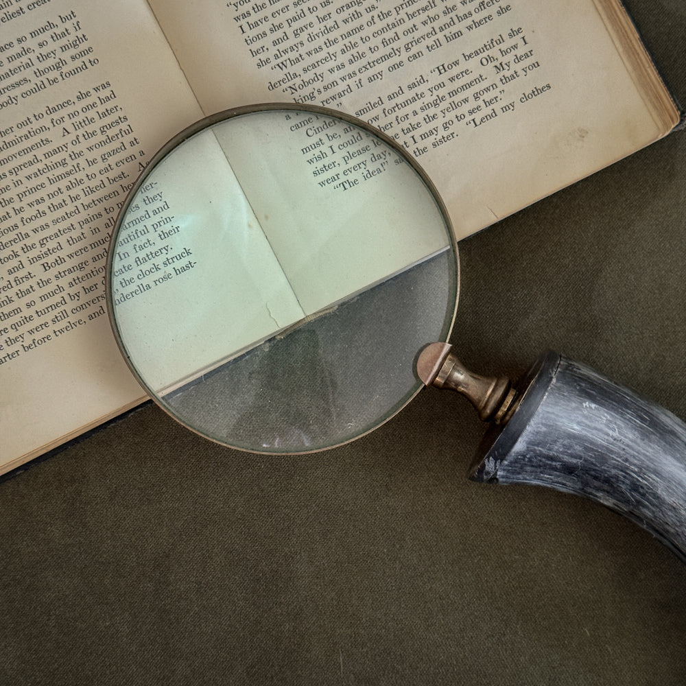 Vintage horn handle magnifying glass.