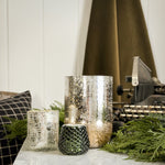 Illume - Large Mercury Balsam and Cedar Candle.