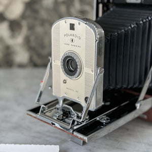 Vintage brown Polaroid land camera.