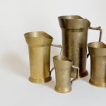 Vintage Brass Measuring Cup Set.