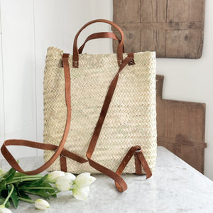 Woven Backpack with leather strap.