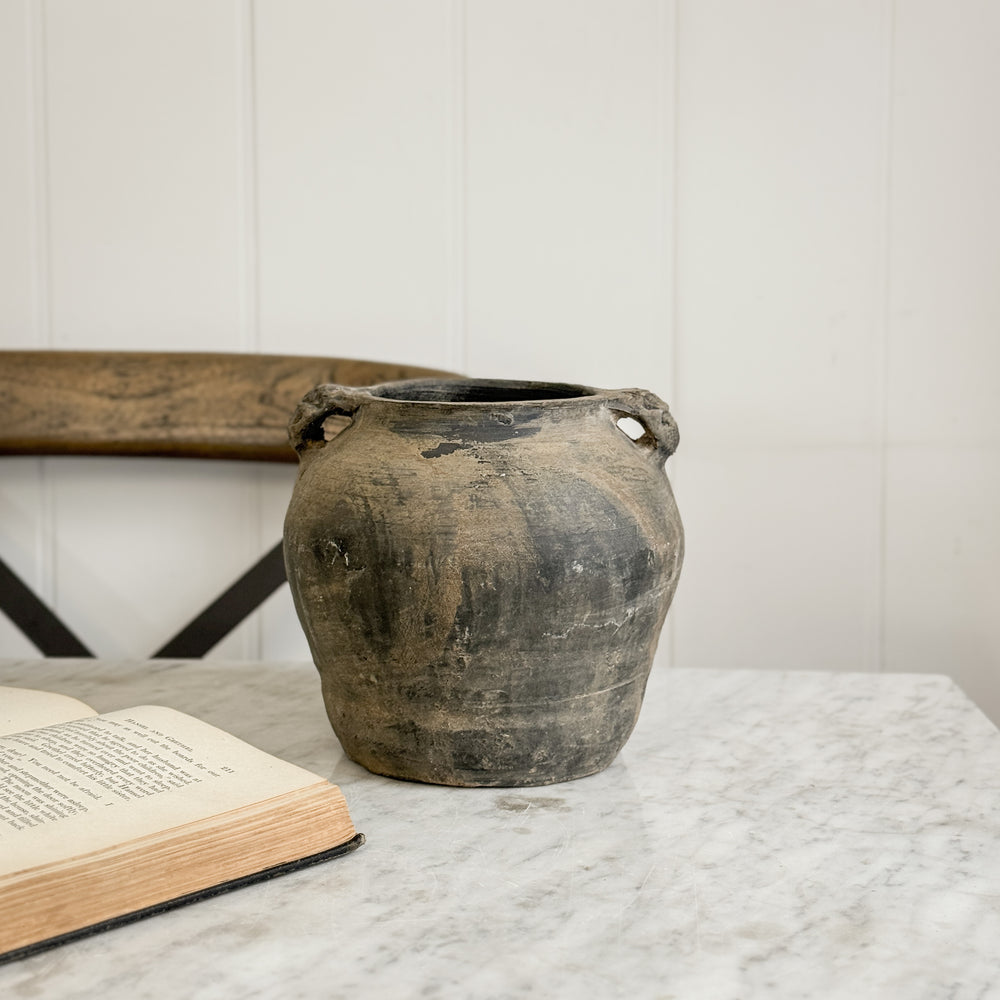Vintage black pottery vase w/ handles