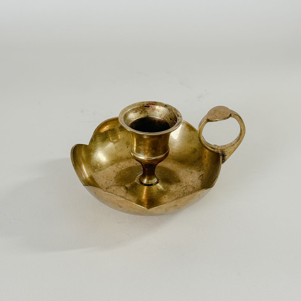 Vintage brass flower taper holder.