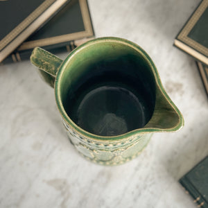Vintage green McCoy pottery pitcher.