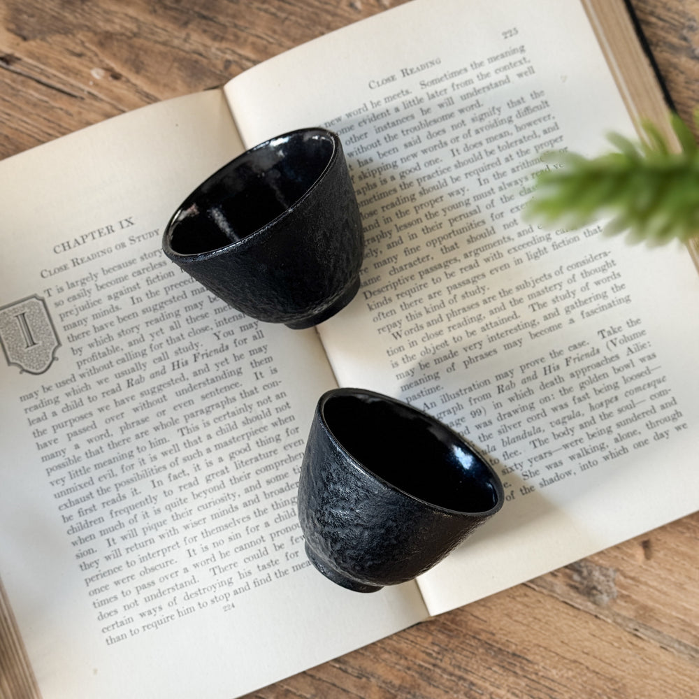 Vintage small black bowl cups.