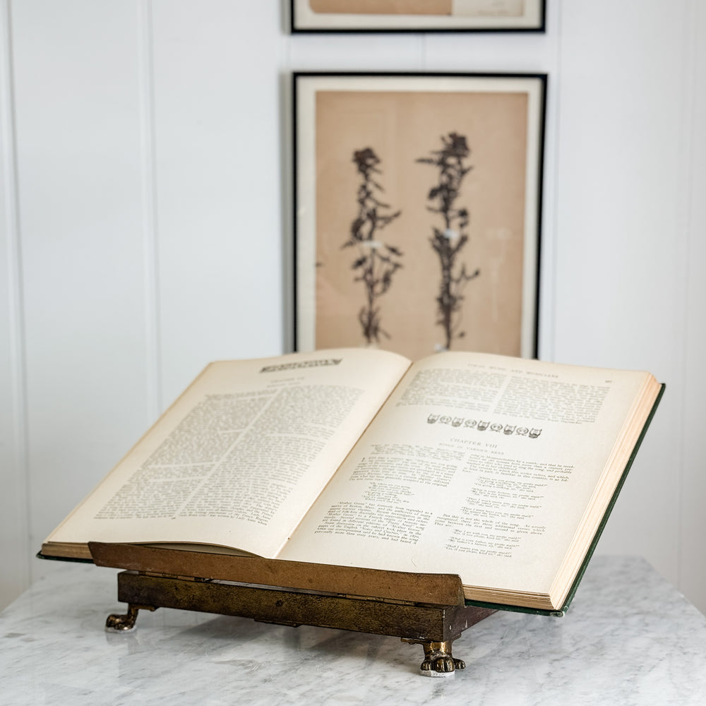 Vintage brass book display.