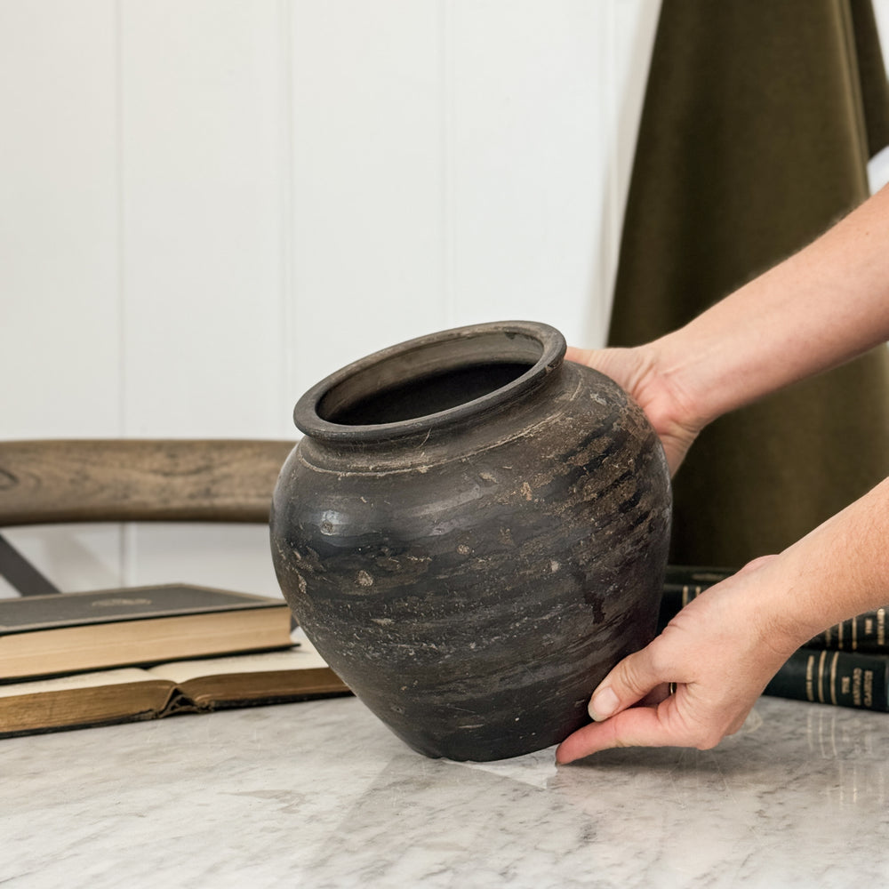 Vintage black pottery vase