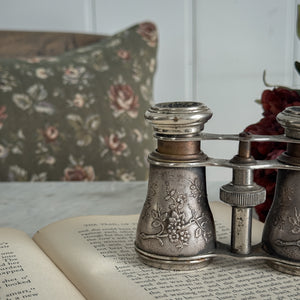 Vintage bird embossed opera glasses.