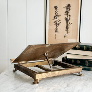 Vintage brass book display.