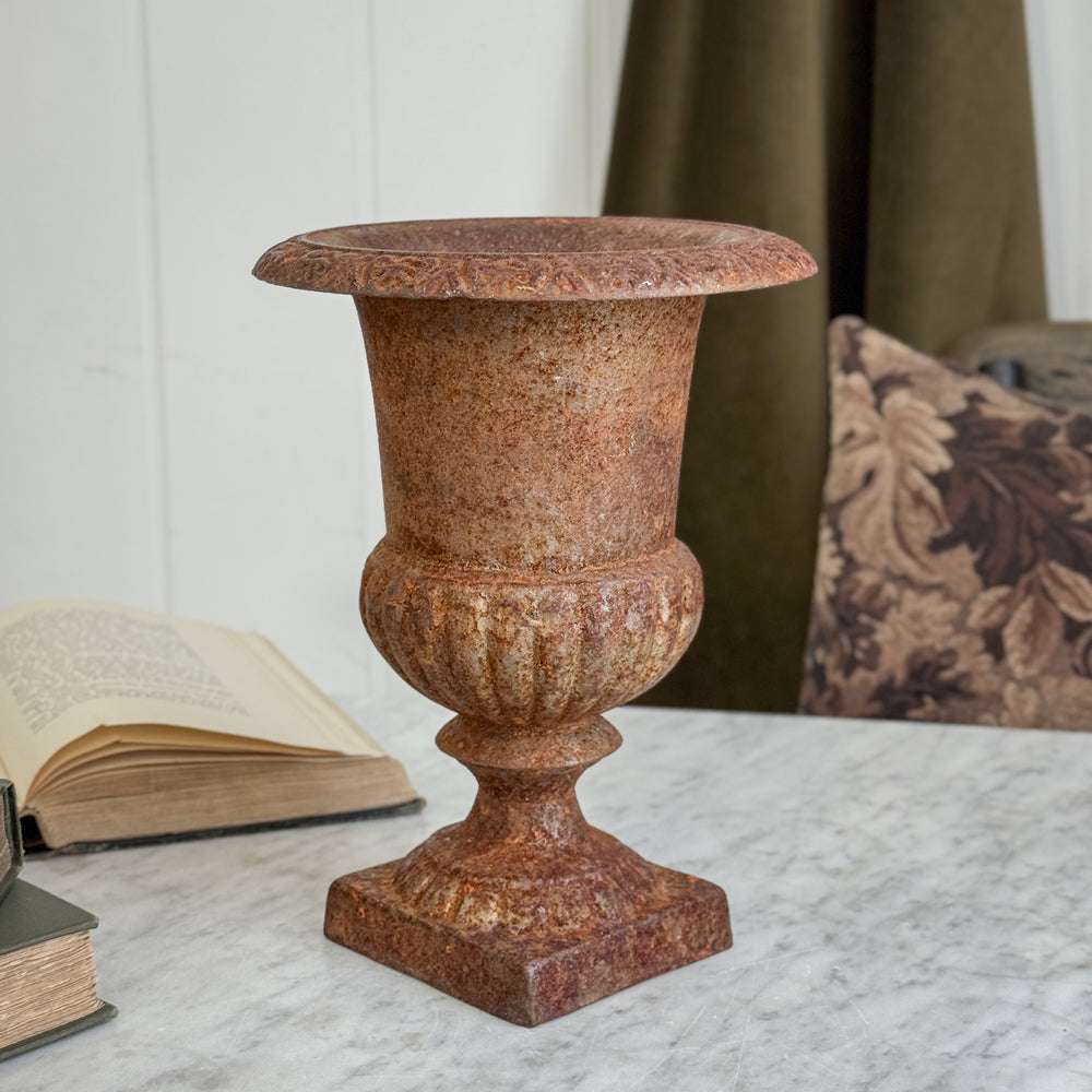 Vintage cast iron flower urn.