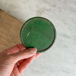 Vintage green metal tin