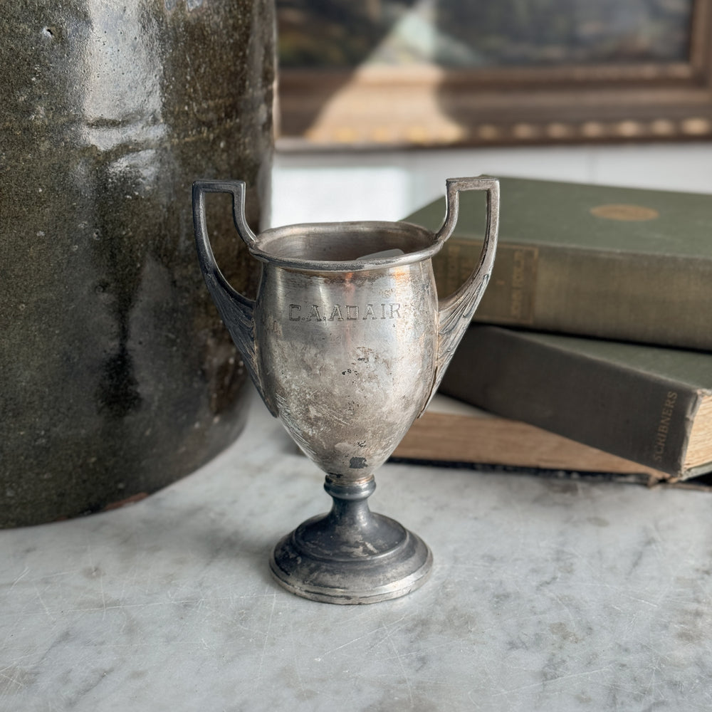 Vintage Clogg's Ltd trophy.