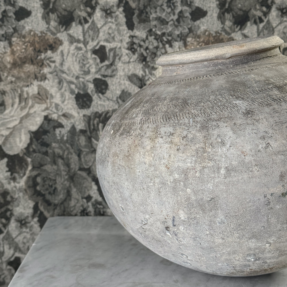 Vintage black clay mud pot
