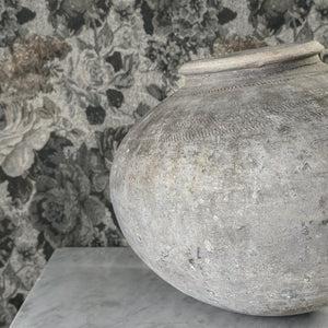Vintage black clay mud pot
