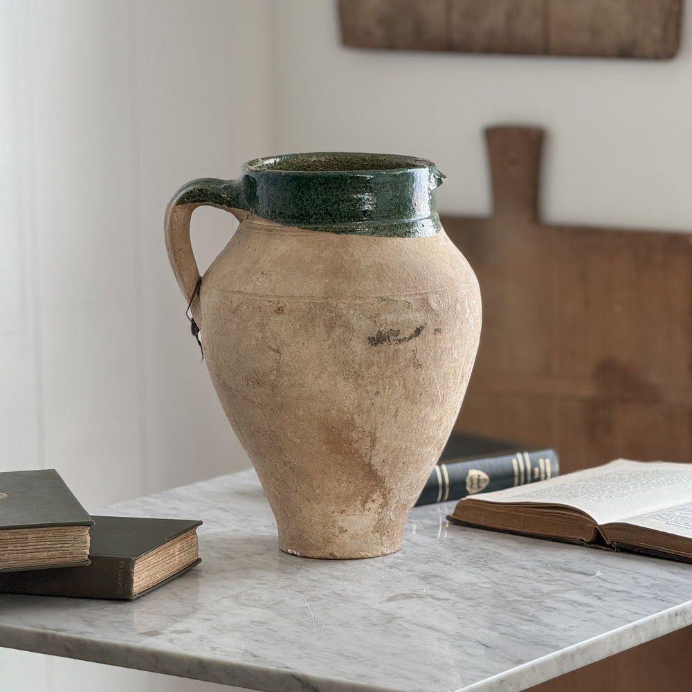 Vintage medium green olive jar.