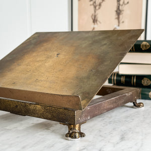 Vintage brass book display.