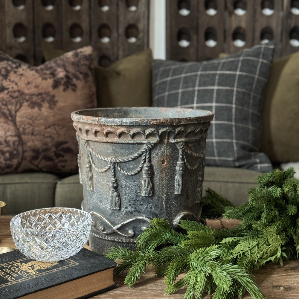 Vintage cast iron tassel planter.