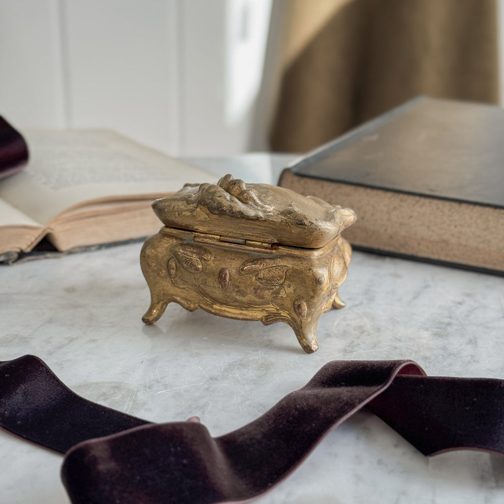 Vintage gold jewellery casket.