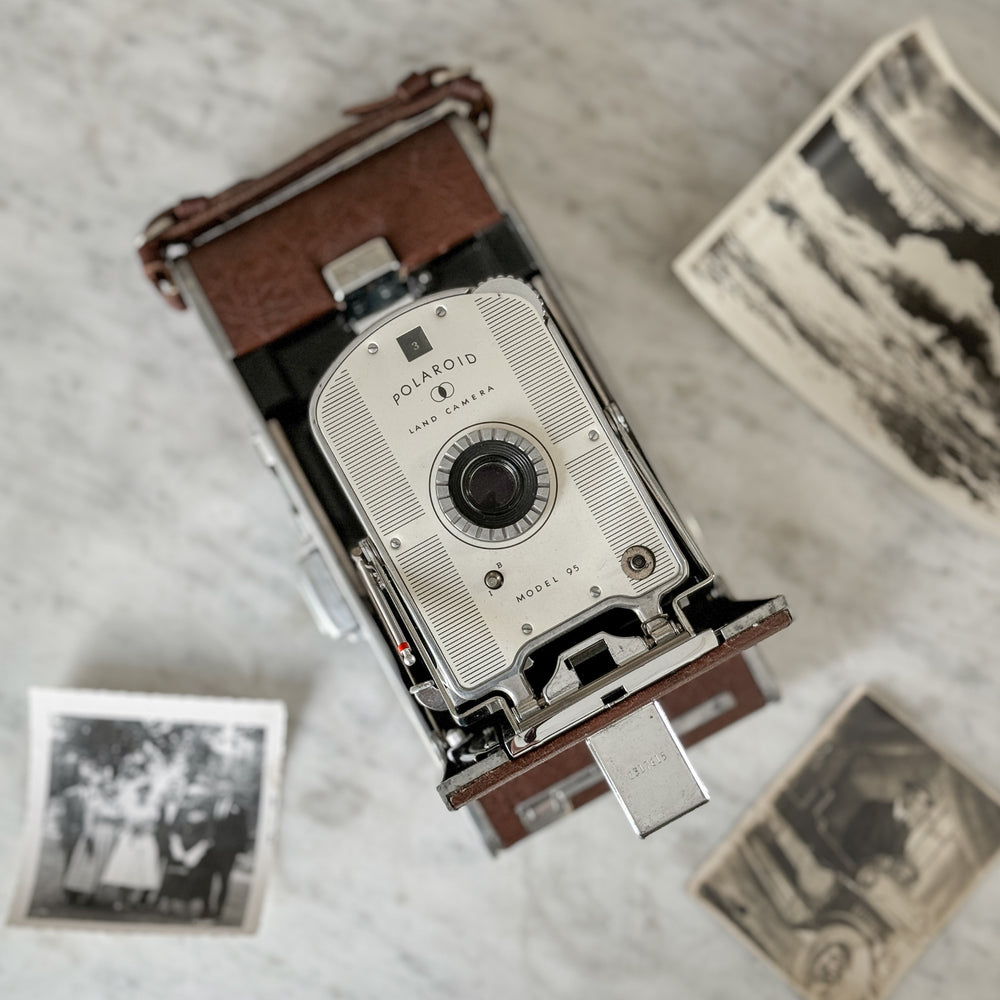 Vintage brown Polaroid land camera.