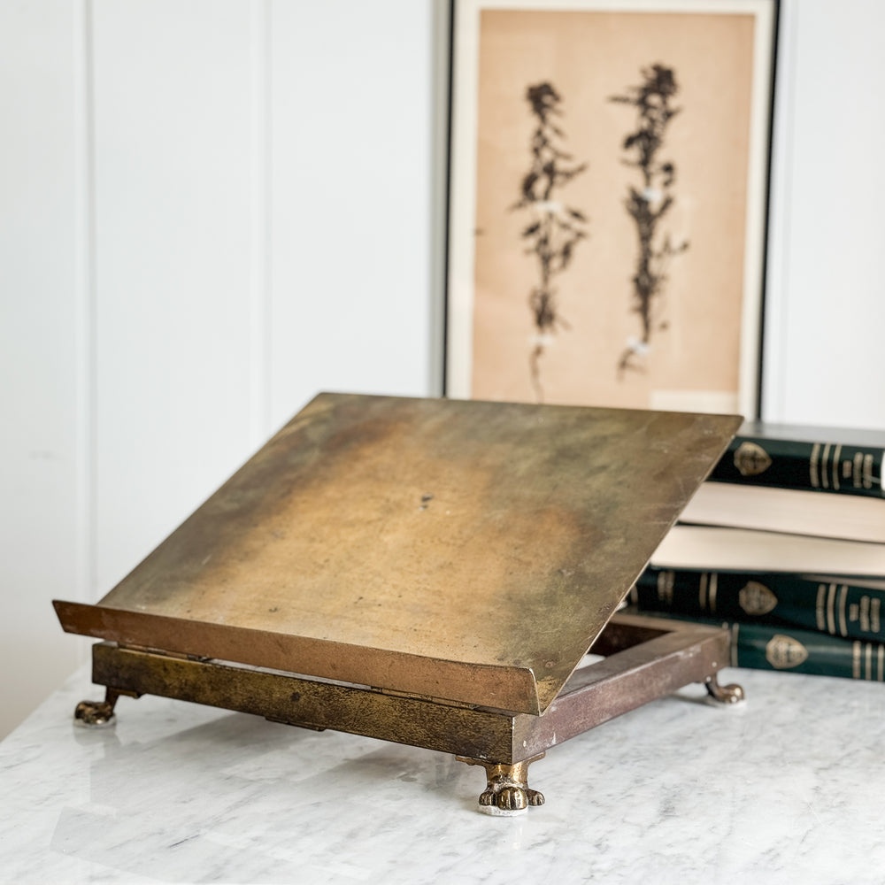 Vintage brass book display.