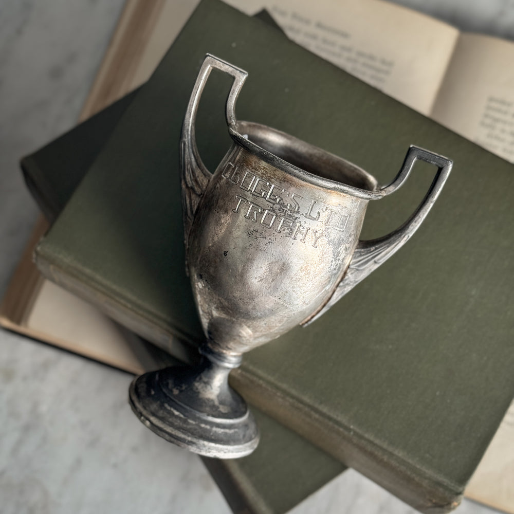 Vintage Clogg's Ltd trophy.