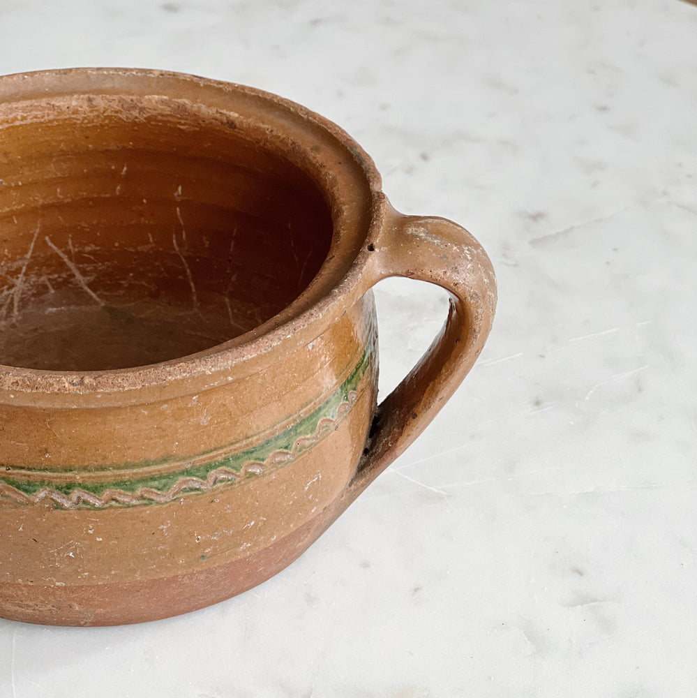 Vintage squatty pottery with handle