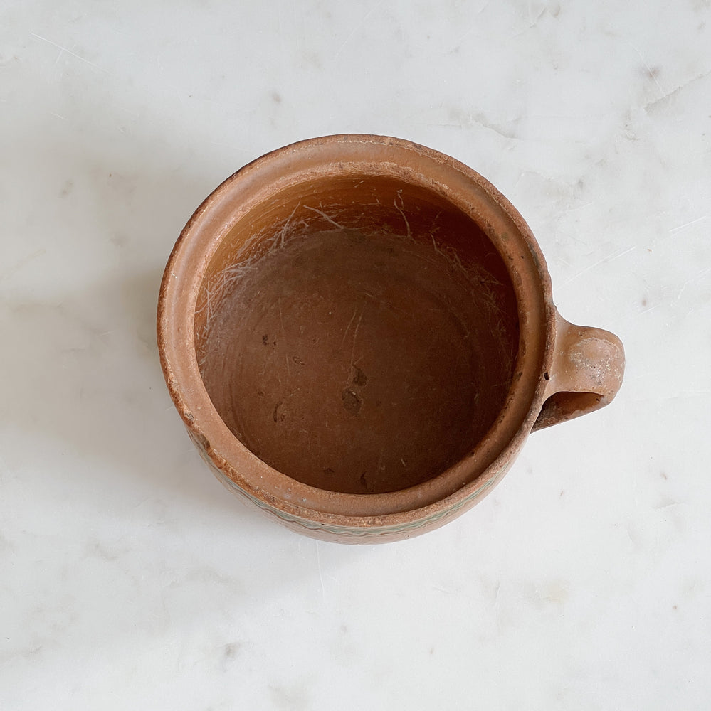 Vintage squatty pottery with handle
